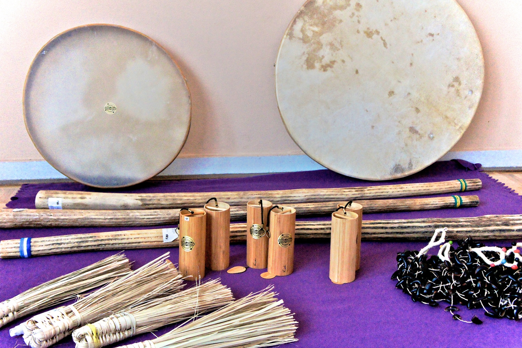 Soundfulness frame drums and bamboo shakers laid out